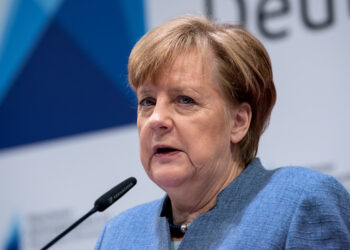 German chancellor Angela Merkel speaks during a press conference after German economy summit talks in Munich, southern Germany on March 9, 2018.
German Chancellor Angela Merkel hailed the surprise announcement of a summit between US President Donald Trump and North Korea's Kim Jong Un as a "glimmer of hope". / AFP PHOTO / dpa / Sven Hoppe / Germany OUT