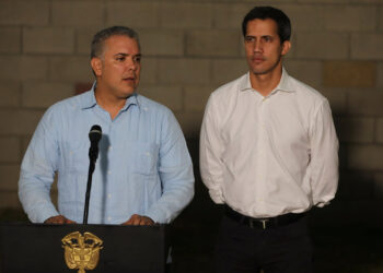 Colombia's President Ivan Duque speaks to the media alongside Venezuelan opposition leader Juan Guaido, who many nations have recognized as the country's rightful interim ruler, during a news conference near the Tienditas cross-border bridge between Colombia and Venezuela, in Cucuta, Colombia February 23, 2019. REUTERS/Luisa Gonzalez