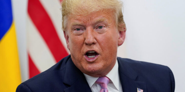 U.S. President Donald Trump looks on during a bilateral meeting with Brazil's President Jair Bolsonaro  at the G20 leaders summit in Osaka, Japan, June 28, 2019. REUTERS/Kevin Lamarque