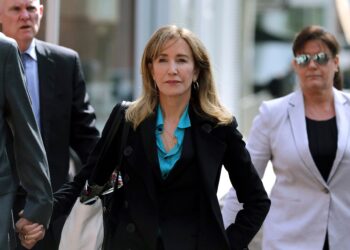 Mandatory Credit: Photo by Charles Krupa/AP/Shutterstock (10185765e)
Actress Felicity Huffman arrives at federal court in Boston, to face charges in a nationwide college admissions bribery scandal
College Admissions-Bribery, Boston, USA - 03 Apr 2019