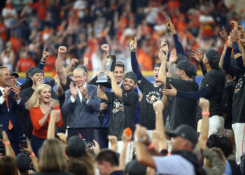 Oct 19, 2019; Houston, TX, USA; Houston Astros second baseman Jose Altuve (27) is presented the ALCS MVP Trophy after defeating the New York Yankees in game six of the 2019 ALCS playoff baseball series at Minute Maid Park. Mandatory Credit: Troy Taormina-USA TODAY Sports