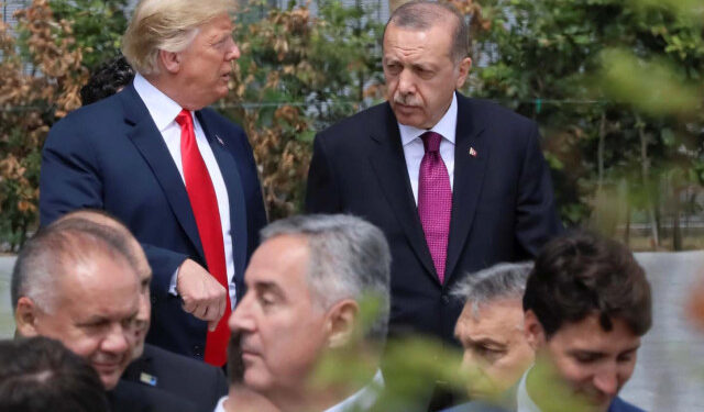 U.S. President Donald Trump, Turkish President Tayyip Erdogan and Canada's Prime Minister Justin Trudeau are seen at the start of the NATO summit in Brussels, Belgium July 11, 2018.   REUTERS/Reinhard Krause