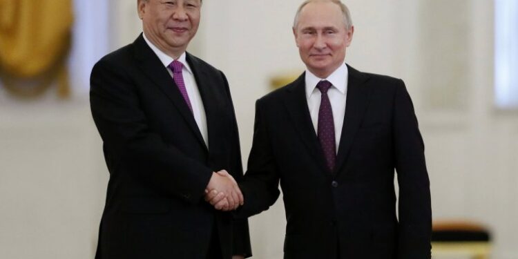 Russian President Vladimir Putin shakes hands with his Chinese counterpart Xi Jinping at the Kremlin in Moscow, Russia, June 5, 2019. REUTERS/Evgenia Novozhenina/Pool