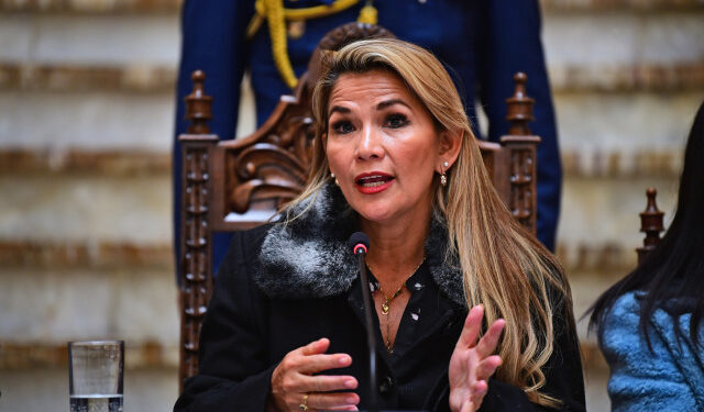 Bolivian interim president Jeanine Anez speaks during a press conference in La Paz on November 15, 2019. - Bolivia's interim president Jeanine Anez on Thursday ruled out exiled leader Evo Morales from standing in new elections as thousands of demonstrators marched through La Paz in support of the socialist icon and against the new, acting leader. (Photo by RONALDO SCHEMIDT / AFP)