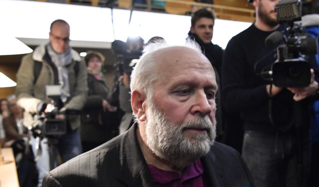 Bernard Preynat, a former priest accused on sexual assaults, waits the beginning of his trial, on January 13, 2020, in the courthouse of Lyon, southeastern France. - The trial of Bernard Preynat , whose alleged sexual assaults on young scouts in the Lyon region triggered the Barbarin case, was postponed on January 14, 2020 due the lawyers strike. (Photo by PHILIPPE DESMAZES / AFP)