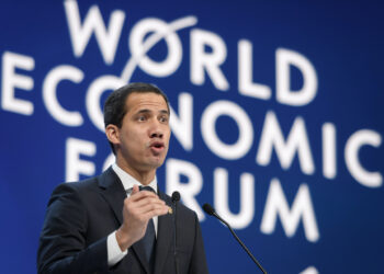 Venezuelan opposition leader Juan Guaido addresses the World Economic Forum (WEF) annual meeting in Davos, on January 23, 2020. (Photo by FABRICE COFFRINI / AFP)