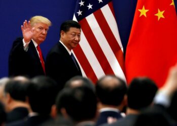 FILE PHOTO: U.S. President Donald Trump and China's President Xi Jinping meet business leaders at the Great Hall of the People in Beijing, China, November 9, 2017. REUTERS/Damir Sagolj/File Photo