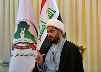 Qais al-Khazali, the leader of the militant Shiite group Asaib Ahl al-Haq, or League of the Righteous, speaks during an interview with The Associated Press in Baghdad, Iraq, Monday, Jan. 28, 2019. Al-Khazali said Monday that he expects a vote by the Iraqi parliament calling for the withdrawal of U.S. troops from the country within the next few months. Al-Khazali said there is no longer a justification for thousands of U.S. troops in the country after the Islamic State group has been defeated. (AP Photo/Khalid Mohammed)