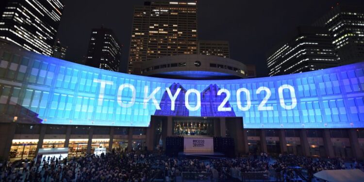 A projection that reads "Tokyo 2020" is seen during a ceremony marking three years to go before the start of the Tokyo 2020 Olympic games at the Tokyo Metropolitan Assembly Building on July 24, 2017.
Japan marked three years before the 2020 Tokyo Olympics on July 24 with celebration and fanfare -- even as organisers struggle to contain soaring costs and restore credibility. / AFP PHOTO / Kazuhiro NOGI        (Photo credit should read KAZUHIRO NOGI/AFP via Getty Images)