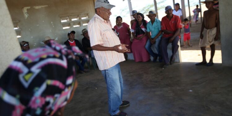 Colombian Rafael Sapuana, mediator or Putchipuu in Wayuunaiki language, speaks during a reconciliation ceremony between Colombian and Venezuela indigenous from the Wayuu tribe, in Castilletes, Colombia February 19, 2020. Picture taken February 19, 2020. REUTERS/Luisa Gonzalez