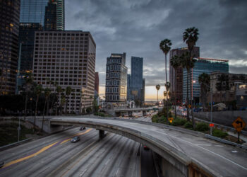 (FILES) In this file photo taken on March 15, 2020, the 110 Freeeway is seen in downtown Los Angeles, California. - Another 6.65 million US workers filed for unemployment benefits last week, the most ever recorded, as the coronavirus forces businesses to shut down nationwide, the Labor Department reported on April 2, 2020. (Photo by Apu GOMES / AFP)