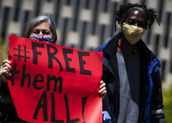 NEW YORK, NY - MAY 13: People take part in a protest near US Immigration building on May 13, 2020 in New York City. Protesters were demanding an end to the continued detention and deportation of non-US Citizens. Conditions within detention centers guarantee exposure to COVID-19 and detainees who have tested positive for COVID-19 are still being deported.   Eduardo Munoz Alvarez/Getty Images/AFP