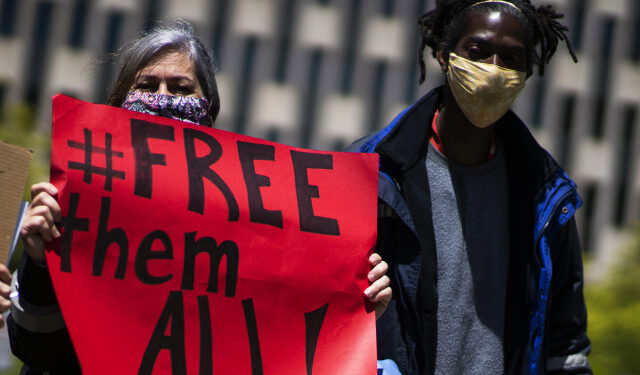 NEW YORK, NY - MAY 13: People take part in a protest near US Immigration building on May 13, 2020 in New York City. Protesters were demanding an end to the continued detention and deportation of non-US Citizens. Conditions within detention centers guarantee exposure to COVID-19 and detainees who have tested positive for COVID-19 are still being deported.   Eduardo Munoz Alvarez/Getty Images/AFP