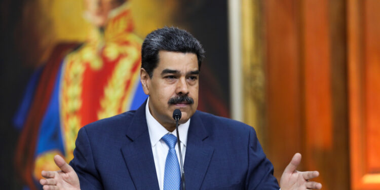 Venezuela's President Nicolas Maduro gestures as he speaks during a news conference at Miraflores Palace in Caracas, Venezuela February 14, 2020. REUTERS/Fausto Torrealba NO RESALES. NO ARCHIVES