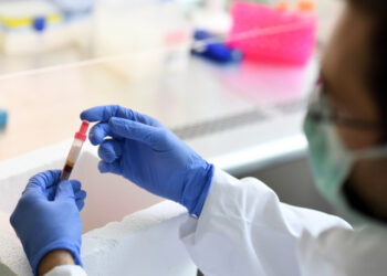 Andreas Wieser from the department of Infection and Tropical Medicine at the University of Munich, works with blood samples for a study about the coronavirus disease (COVID-19), in Munich Germany, April 17, 2020. REUTERS/Andreas Gebert