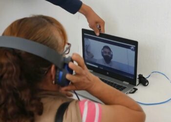 Videollamada, cárcel México, coronavirus. Foto captura de video AFP.