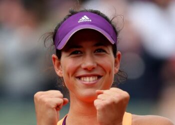 PARIS, FRANCE - MAY 28:  Garbine Muguruza of Spain celebrates her victory in her women's singles match against Serena Williams of the United States on day four of the French Open at Roland Garros on May 28, 2014 in Paris, France.  (Photo by Matthew Stockman/Getty Images)