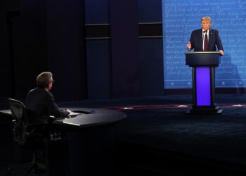 CLEVELAND, OHIO - SEPTEMBER 29:  U.S. President Donald Trump participates in the first presidential debate against Democratic presidential nominee Joe Biden,  moderated by Fox News anchor Chris Wallace (L) at the Health Education Campus of Case Western Reserve University on September 29, 2020 in Cleveland, Ohio. This is the first of three planned debates between the two candidates in the lead up to the election on November 3.  (Photo by Win McNamee/Getty Images)