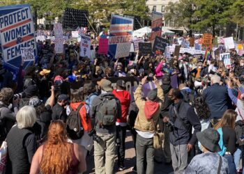 Demonstrators gather to take part in the nationwide Women's March on October 17, 2020, at Freedom Plaza in Washington, DC. (Photo by Daniel SLIM / AFP)