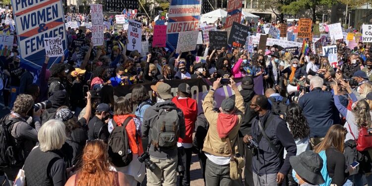 Demonstrators gather to take part in the nationwide Women's March on October 17, 2020, at Freedom Plaza in Washington, DC. (Photo by Daniel SLIM / AFP)