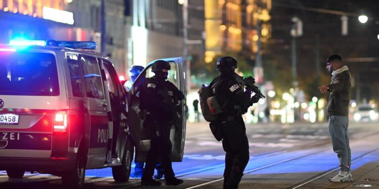 Austrian police special forces search a civilian infront of The Wiener Staatsoper (Vienna State Opera) after a shooting near the Stadttempel' synagogue in Vienna, Austria, 02 November 2020. According to recent reports, at least one person is reported to have died and many are injured in what officials treat as a terror attack. (Atentado, Viena) EFE/EPA/CHRISTIAN BRUNA