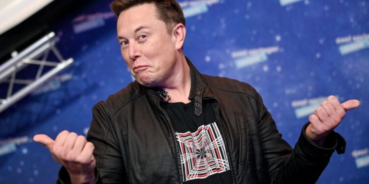 SpaceX owner and Tesla CEO Elon Musk poses as he arrives on the red carpet for the Axel Springer Awards ceremony, in Berlin, on December 1, 2020. (Photo by Britta Pedersen / POOL / AFP) (Photo by BRITTA PEDERSEN/POOL/AFP via Getty Images)