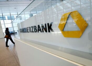 FILE PHOTO: A company logo is pictured at the headquarters of Germany's Commerzbank AG during the annual results news conference in Frankfurt, Germany, February 13, 2020.  REUTERS/Ralph Orlowski