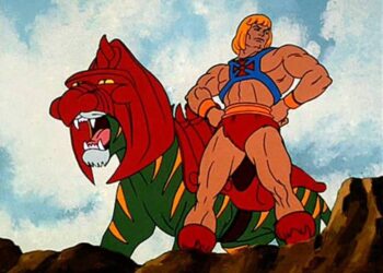 He-Man, Cringer, Battle Cat. Foto de archivo.