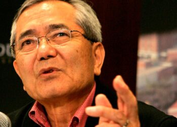 WEST LAFAYETTE, IN  - OCTOBER 6:   Chemistry professor Eiichi Negishi gestures as he speaks during a news conference after he was awarded a share in the Nobel Prize for Chemistry October 6, in West Lafayette, Indiana.  (Photo by Frank Polich/Getty Images)