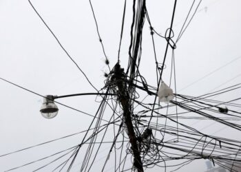 A light post with electrical cables is seen during a blackout in the Catia slum in Caracas, Venezuela March 8, 2019. REUTERS/Carlos Jasso