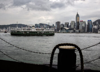 (FILES) In this file photo taken on July 15, 2021, a Star Ferry crosses Victoria Harbour in Hong Kong. - The US on July 16, 2021, warned its business community of growing risks of operating in Hong Kong following a clampdown by China in the major financial hub. In a long-awaited advisory that has already been denounced by China, US government agencies led by the State Department told entrepreneurs that they face particular risks from the imposition a year ago of a draconian new security law. (Photo by ISAAC LAWRENCE / AFP)