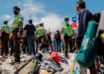 Desalojo campamento de migrantes venezolanos en Chile. Foto agencias.