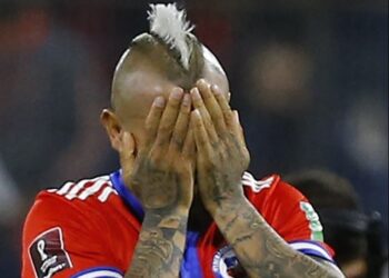 Chile's Arturo Vidal reacts after losing against Uruguay the South American qualification football match between Chile and Uruguay, failing to qualify for the FIFA World Cup Qatar 2022, at the San Carlos de Apoquindo Stadium in Santiago on March 29, 2022. (Photo by Marcelo HERNANDEZ / POOL / AFP)