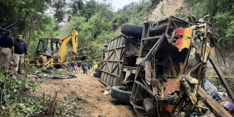 This handout picture released by the Tlaxiaco Municiapl Police shows the remains of a bus after it plummeted into a ravine in the outskirts of Magdalena Peñasco, Oaxaca state, Mexico on July 5, 2023. At least 25 people were killed in Mexico when a passenger bus plummeted into a ravine Wednesday in the southern state of Oaxaca, police said. "The preliminary toll is 25 people dead and 17 seriously injured," a police officer told AFP by telephone, asking not to be identified because he was not authorized to speak to the media. (Photo by Tlaxiaco Municipal Police / AFP) / RESTRICTED TO EDITORIAL USE - MANDATORY CREDIT "AFP PHOTO / TLAXIACO MUNICIPAL POLICE" - NO MARKETING NO ADVERTISING CAMPAIGNS - DISTRIBUTED AS A SERVICE TO CLIENTS