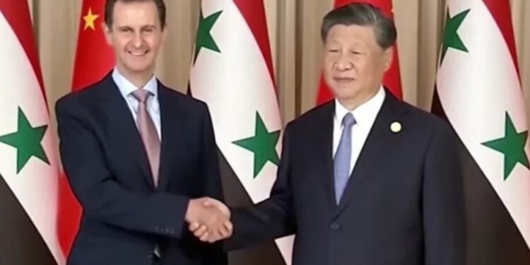 Xi Jinping y Bashar al Assad