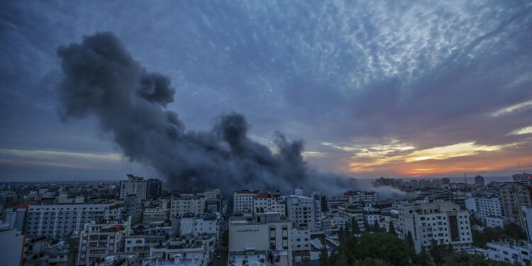 Gaza City (---), 07/10/2023.- Smoke rises after Israeli warplanes targeted the Palestine tower in Gaza City, 07 October 2023. Rocket barrages were launched from the Gaza Strip early 07 October in a surprise attack on Israel claimed by the Islamist movement Hamas. In a televised statement, the Israeli prime minister said the country is at war. EFE/EPA/MOHAMMED SABER