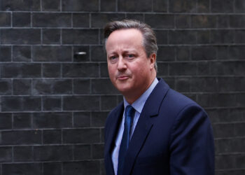 Former British Prime Minister David Cameron walks outside 10 Downing Street in London, Britain November 13, 2023. REUTERS/Suzanne Plunkett