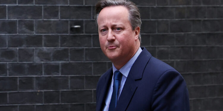 Former British Prime Minister David Cameron walks outside 10 Downing Street in London, Britain November 13, 2023. REUTERS/Suzanne Plunkett