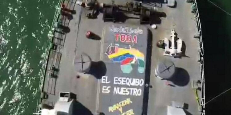 This handout picture released by the Venezuelan Armed Forces on December 29, 2023, shows a Venezuelan frigate with the inscription "Essequibo is ours" while conducting military exercises near the sea in dispute with Guyana. "To combat, let's go forward!" orders Venezuelan President Nicolas Maduro, followed by the broadcast of images of fighter jets and military frigates near the sea in dispute with Guyanaa show of force before a UK warship arrived in the area this Friday. (Photo by Handout / Venezuelan Armed Forces / AFP) / RESTRICTED TO EDITORIAL USE - MANDATORY CREDIT "AFP PHOTO /   VENEZUELAN ARMED FORCES" - NO MARKETING NO ADVERTISING CAMPAIGNS - DISTRIBUTED AS A SERVICE TO CLIENTS