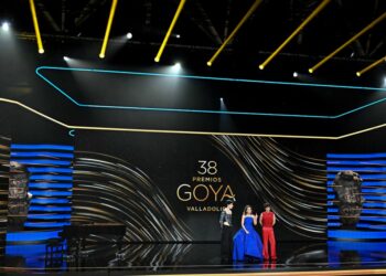 Spanish singer and actress Ana Belen and Spanish film directors Javier Calvo and Javier Ambrossi aka 'Los Javis' present the 38th Goya Awards ceremony in Valladolid, on February 10, 2024. (Photo by JAVIER SORIANO / AFP)