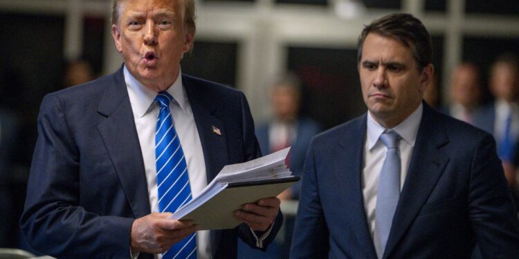 NEW YORK, NEW YORK - MAY 13: Former U.S. President Donald Trump with attorney Todd Blanche speaks to the media at the end of the day during his trial for allegedly covering up hush money payments at Manhattan Criminal Court on May 13, 2024 in New York City. Trump was charged with 34 counts of falsifying business records last year, which prosecutors say was an effort to hide a potential sex scandal, both before and after the 2016 presidential election. Trump is the first former U.S. president to face trial on criminal charges.   Steven Hirsch-Pool/Getty Images/AFP (Photo by POOL / GETTY IMAGES NORTH AMERICA / Getty Images via AFP)