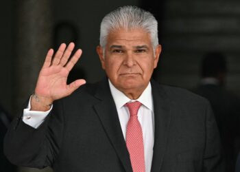 Panama's President-elect Jose Raul Mulino wave to the media before his official meeting with President Laurentino Cortizo at the Presidential Palace in Panama City May 7, 2024. Jose Raul Mulino, the protege of a graft-convicted former head of state, was declared Panama's president-elect after elections Sunday. Mulino won the single-round, first-past-the-post race, securing 34 percent of votes cast, the Central American country's electoral tribunal said. (Photo by MARTIN BERNETTI / AFP)