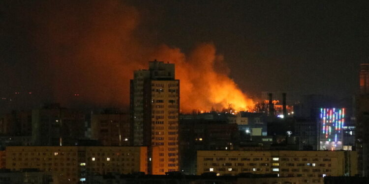 Smoke and flames rise over during the shelling near Kyiv, as Russia continues its invasion of Ukraine February 26, 2022. REUTERS/Gleb Garanich