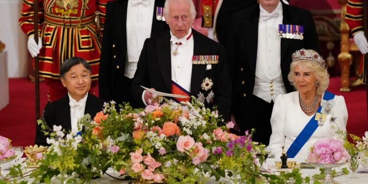 Britain's King Charles III (C) delivers a speech as Queen Camilla and Emperor Naruhito of Japan listen during a State Banquet at Buckingham Palace in London on June 25, 2024, on the first day of a three-day State Visit by Japan's Emperor and Empress to Britain. - The Japanese royal couple arrived in Britain for a three-day state visit hosted by King Charles III. (Photo by Jordan Pettitt / POOL / AFP)