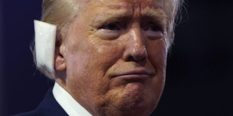 Republican presidential nominee and former U.S. President Donald Trump looks on during Day 1 of the Republican National Convention (RNC), at the Fiserv Forum in Milwaukee, Wisconsin, U.S., July 15, 2024. REUTERS/Elizabeth Frantz