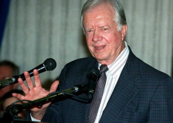 (FILES) Former US President Jimmy Carter speaks to reporters in Jerusalem on January 18, 1996. - Carter, the 100-year-old former US president and Nobel peace laureate who rose from humble beginnings in rural Georgia to lead the nation from 1977 to 1981, has died, his nonprofit foundation said on December 29, 2024. (Photo by AFP)